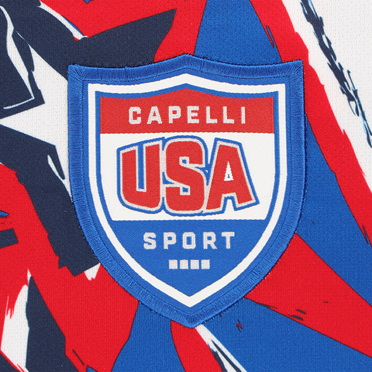 Embroidered USA Sport crest patch on red, white, and blue jersey