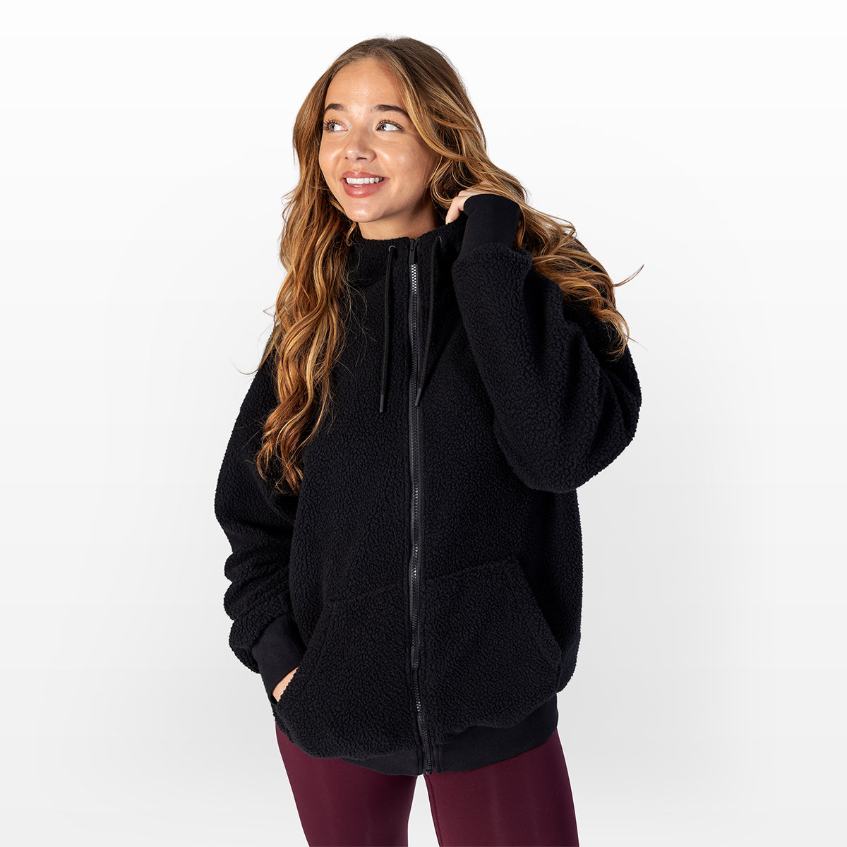 Women's black sherpa zip-up hoodie with zip front and hood drawstrings