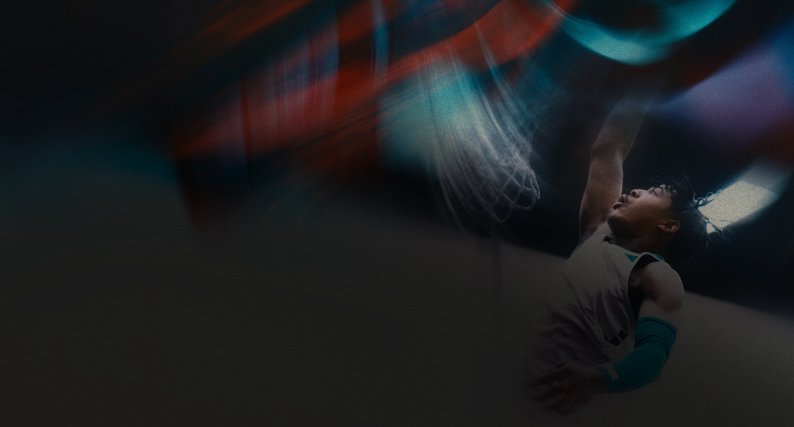 Person playing basketball with dynamic lighting effects