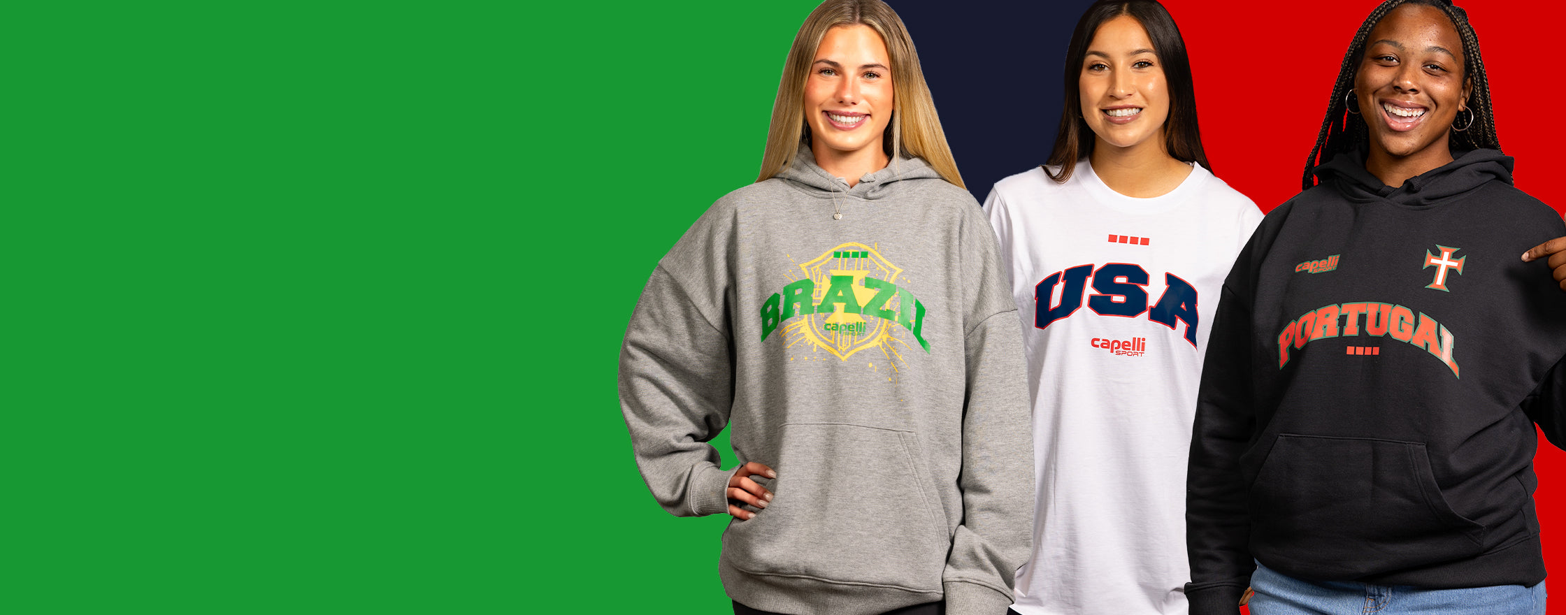 Three women wearing branded hoodies on a green, red, and black background