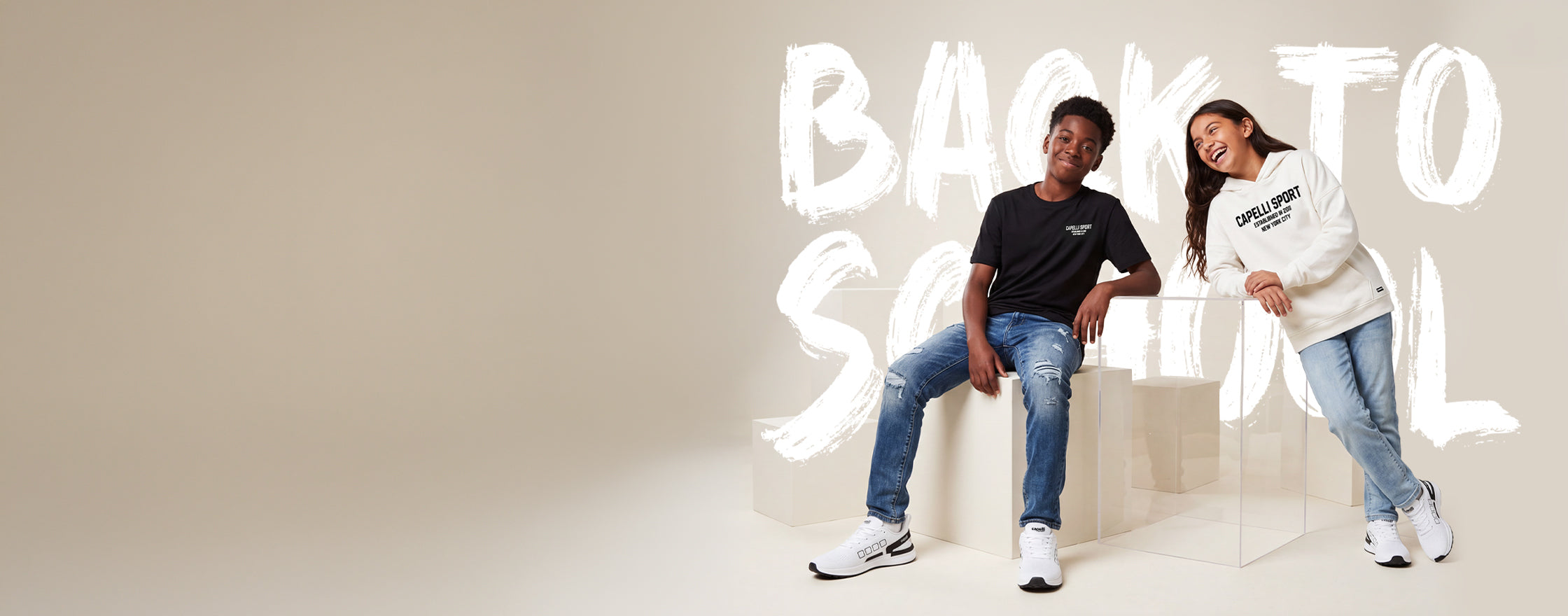 Kids wearing Capelli Sport back to school hoodies and t-shirts