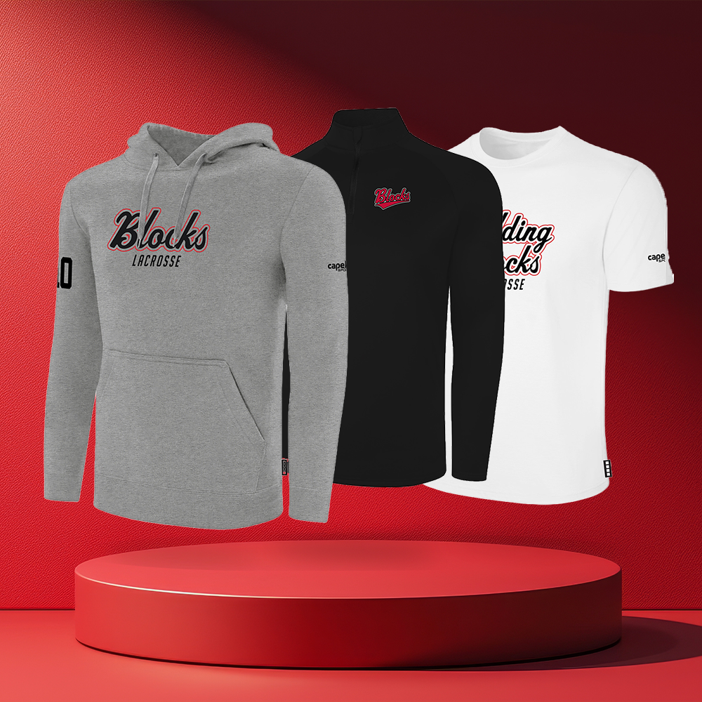 Three athletic apparel pieces are displayed on a red studio background: a gray pullover hoodie, a black long-sleeve quarter-zip top, and a white short-sleeve T-shirt. Each garment features a stylized red and black 'Blacks Varsity' graphic on the chest, with additional small branding and text on the sleeves and hem.