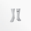 White crew grip socks with ribbed knit and dotted traction at the sole